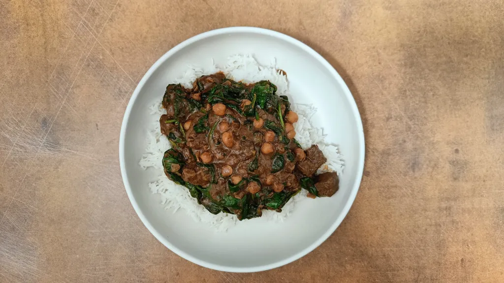 Photograph of Gazan beef, chickpeas and swiss chard.
