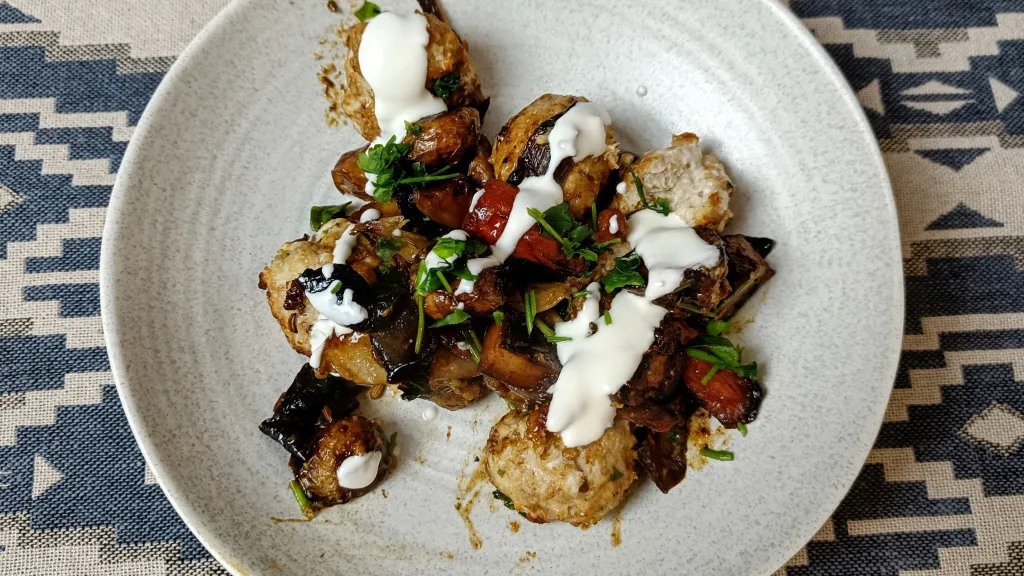 Photograph of Lemon-scented pork meatballs with fennel & white wine.