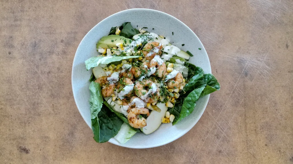 Photograph of Punchy prawn and pear salad.
