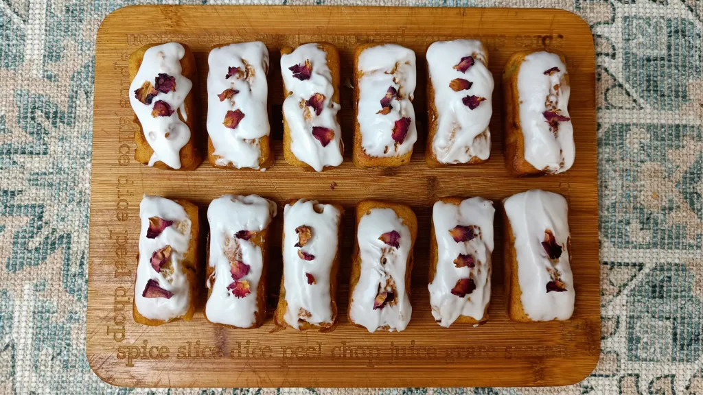 Photograph of Ras el hanout & buttermilk sweet loaf cake with rose icing.